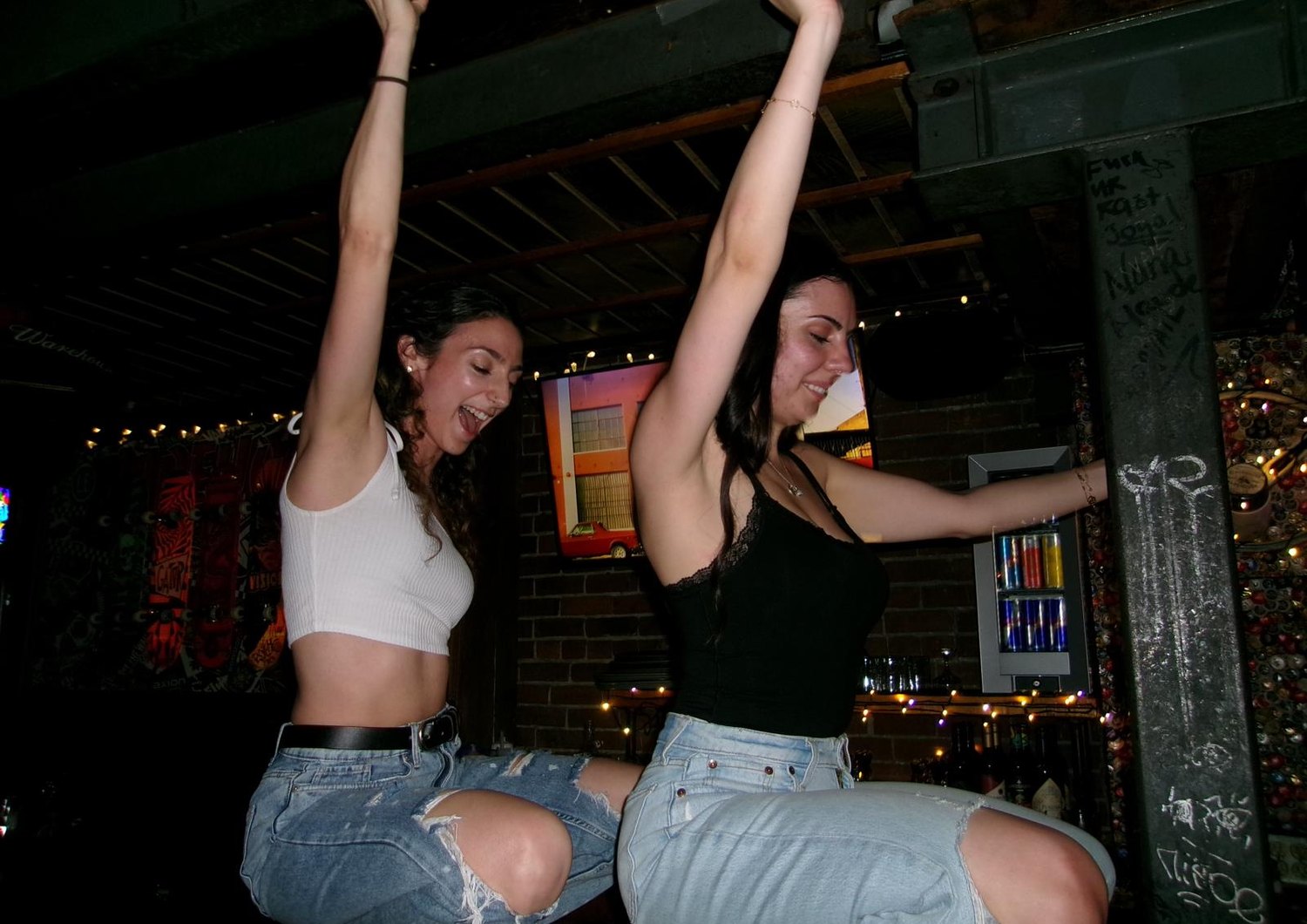 Two students dancing on a night out